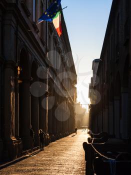 travel to Italy - sunlight on Via Zamboni in University district of Bologna city in autumn