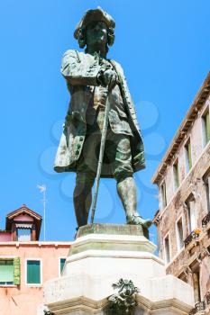 travel to Italy - bronze sculpture of Carlo Goldoni on Campo S Bartolomeo in Venice city