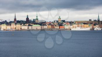 panorama of Stockholm city (Galma Stan) from sea in cloudy autumn day