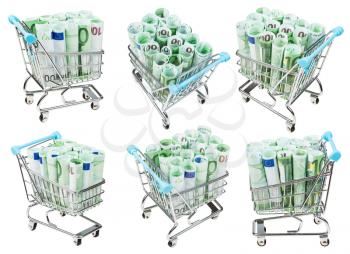 set from shopping carts with rolls from euro banknotes isolated on white background