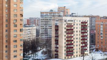apartment buildings in residential district in Moscow city in winter day
