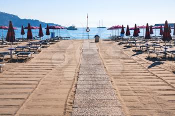 travel to Italy - clean urban beach in giardini naxos town in Sicily in morning