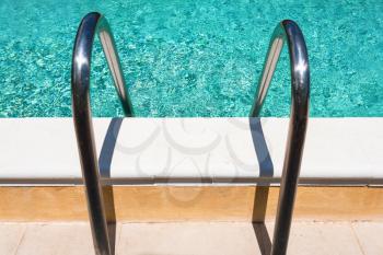 metal handles of outdoor swimming pool