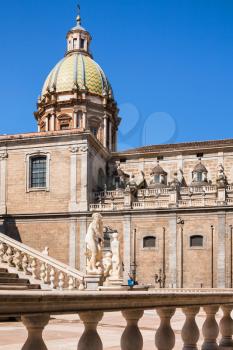 travel to Italy - statue on piazza Pretoria in center of Palermo city and dome of Church of Saint Catherine in Sicily