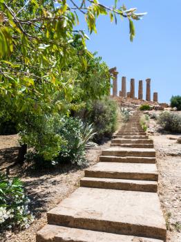 travel to Italy - steps to Temple of Juno (Hera) in Valley of the temples in Agrigento in Sicily