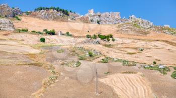travel to Italy - agrarian fields and abandoned village in southern Sicily in summer day