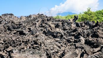 travel to Italy - petrified lava flow after volcano Etna eruption in Sicily