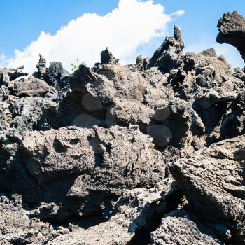 travel to Italy - sharp lava pieces after volcano Etna eruption in Sicily , close up