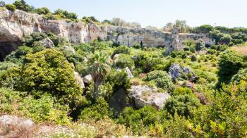 travel to Italy - latomie del paradiso garden in ancient stone career in Archaeological Park (Parco Archeologico della Neapolis) of Syracuse city in Sicily