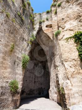 travel to Italy - Orecchio di Dionisio (Ear of Dionysius) cave in Temenites Hill in latomie del paradiso area of Archaeological Park of Syracuse city in Sicily