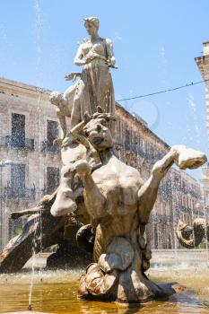 travel to Italy - sculpture of Fountain of Diana on Piazza Archimede in Syracuse in Sicily