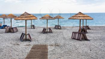 travel to Italy - beach Marina di Cottone on Ionian sea coast in Sicily in overcast day