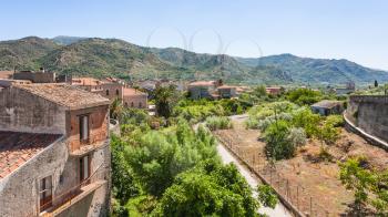 travel to Italy - residential houses in Francavilla di Sicilia town in Sicily