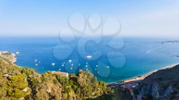 travel to Italy - panorama with Ionian sea from Taormina city in Sicily in summer