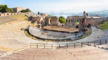 travel to Italy - above view of ancient Teatro Greco (Greek Theatre) in Taormina city in Sicily