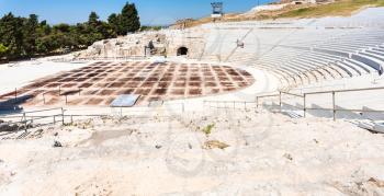 travel to Italy - ancient Greek theatre (teatro greco) in Archaeological Park (Parco Archeologico della Neapolis) of Syracuse city in Sicily