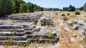 travel to Italy - ruins of ancient Altar of Hieron (L Ara di Ierone II, Great Altar of Syracuse) in Archaeological Park (Parco Archeologico della Neapolis) of Syracuse city in Sicily