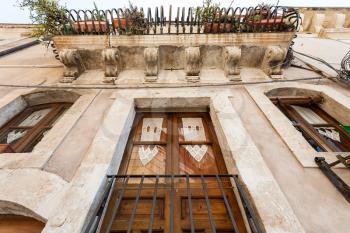 travel to Italy - facade of baroque style urban house in syracuse city , in Sicily