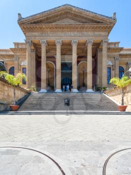 PALERMO, ITALY - JUNE 24, 2011: tourists near entrance of Teatro Massimo Vittorio Emanuele. It is the biggest in Italy opera house and opera company located on the Piazza Verdi in Palermo
