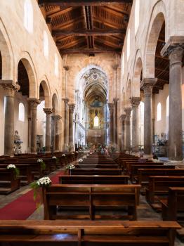 CEFALU, ITALY - JUNE 25, 2011: indoor of Duomo di Cefalu in Sicily. Cathedral - Basilica of Cefalu was erected in 1131 in the Norman architectural style