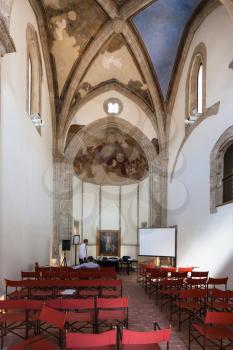 PALERMO, ITALY - JUNE 24, 2011: people in chapel of Palazzo Chiaramonte - Steri in Palermo. The palace was begun in the early 14th century, and was the residence of the lord Manfredi III Chiaramonte