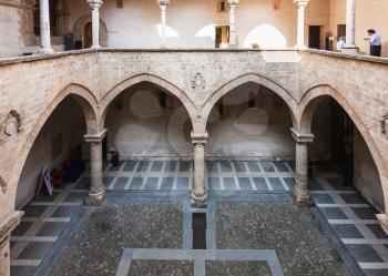 PALERMO, ITALY - JUNE 24, 2011: patio of Palazzo Chiaramonte - Steri in Palermo. The building was begun in the early 14th century, and was the residence of the Sicilian lord Manfredi III Chiaramonte