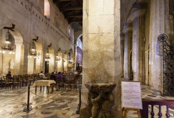 SYRACUSE, ITALY - JULY 3, 2011: interior of Duomo di Siracusa (Cathedral of Syracuse) in Sicily. The present cathedral was constructed by Saint Bishop Zosimo of Syracuse in the 7th century