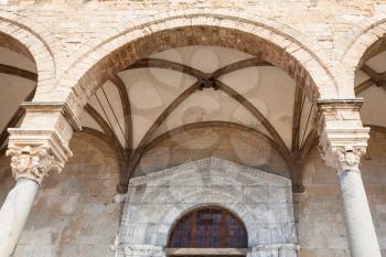 CEFALU, ITALY - JUNE 25, 2011: decoration of entrance in Duomo di Cefalu in Sicily. Cathedral - Basilica of Cefalu was erected in 1131 in the Norman architectural style