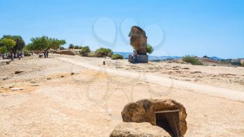 AGRIGENTO, ITALY - JUNE 29, 2011: tourists in Valley of the Temples in Sicily. This area has largest and best-preserved ancient Greek buildings outside of Greece itself