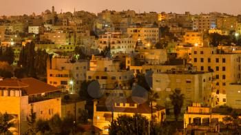 Travel to Middle East country Kingdom of Jordan - residential district in Amman city in night