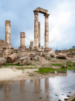 Travel to Middle East country Kingdom of Jordan - Temple of Hercules at Amman Citadel in rain in winter