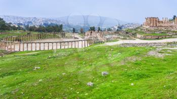Travel to Middle East country Kingdom of Jordan - view of oval forum in ancient Gerasa town and Jerash city in winter