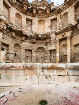 Travel to Middle East country Kingdom of Jordan - view of nymphaeum in Jerash (ancient Gerasa) town in winter