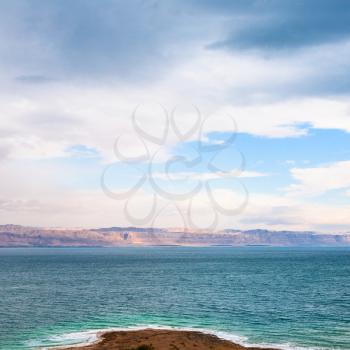 Travel to Middle East country Kingdom of Jordan - view of Dead Sea from Jordan coast on winter sunrise