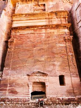 Travel to Middle East country Kingdom of Jordan - ancient nabataean tomb in Petra town