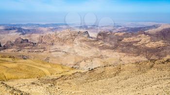 Travel to Middle East country Kingdom of Jordan - view of mountains around Wadi Araba (Arabah, Arava, Aravah) region near Petra town in sunny winter day