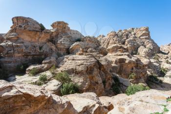Travel to Middle East country Kingdom of Jordan - sandstone mountain around Little Petra town in winter