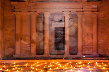 PETRA, JORDAN - FEBRUARY 20, 2012: night beoduin musical show in front of Al-Khazneh (The Treasury) Temple in Petra. Al-Khazneh was built as mausoleum and crypt at the beginning of the 1st century AD