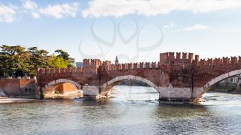 travel to Italy - view of fortified Castel Vecchio Bridge (Scaliger Bridge, Ponte Scaligero) on Adige river in Verona city in spring