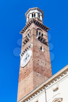 travel to Italy - view of tall tower Torre dei Lamberti in Verona city in spring