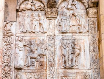 travel to Italy - medieval outdoor low relief on gate of Basilica di San Zeno ( San Zeno Maggiore, San Zenone) in Verona city