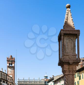 travel to Italy - view of tower Torre del Gardello on Piazza delle Erbe (Market's square) Verona city in spring