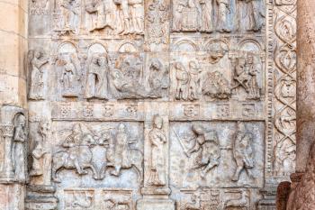 travel to Italy - medieval outdoor low relief of portal of Basilica di San Zeno ( San Zeno Maggiore, San Zenone) in Verona city