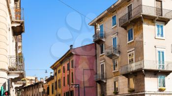 travel to Italy - urban houses on street Via S Paolo in Verona city in spring