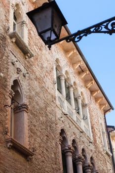 travel to Italy - wall of old palazzo on street Contra Giacomo Zanella in Vicenza city in spring.