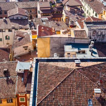 travel to Italy - above view of houses in Verona city from tower Torre dei Lamberti in spring