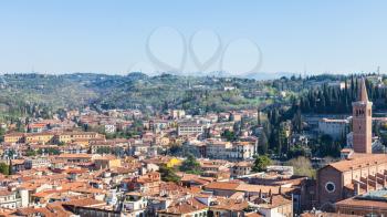 travel to Italy - above view of Verona town with Sant'Anastasia Church from tower Torre dei Lamberti in spring