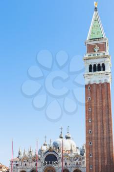 travel to Italy - campanile and St Mark's Basilica on Piazza San Marco in Venice city in spring