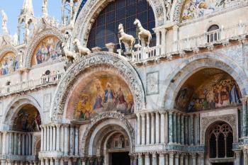 travel to Italy - decorated portal of St Mark's Basilica on Piazza San Marco in Venice city in spring day