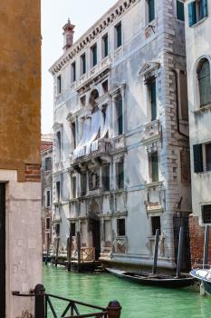 travel to Italy - apartment houses on waterfront of Rio de la Pieta canal in Venice city in spring